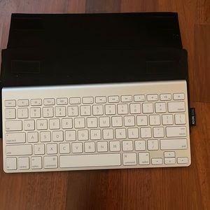 Apple wireless keyboard, case and dust cover for keyboard. Used for grad school.